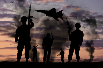  Silhouettes of military soldiers with guns and fighter