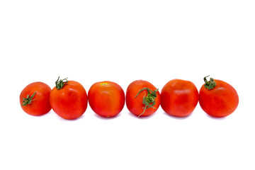 a few tomatoes on a white background isolation
