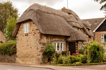 Fototapeta na wymiar Traditional cottage stone house in the Midlands, United Kingdom