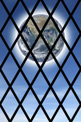 The world seen through a prison bars - concept with image from NASA