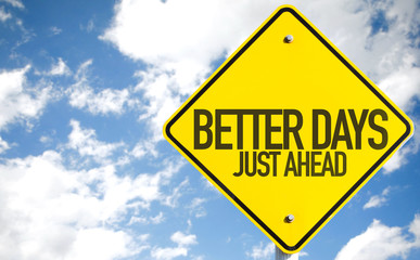 Better Days Just Ahead sign with sky background