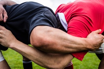 Rugby players doing a scrum