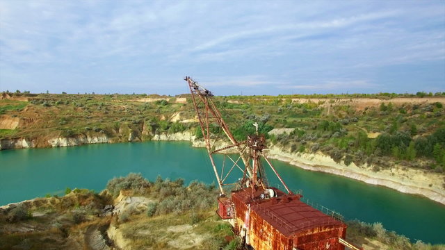 Aerial: giant mining excavator in a quarry