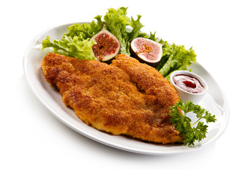 Fried pork chop coat in breadcrumbs and vegetable salad 