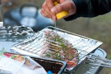 fish fillet of salmon sprinkled with lemon juice