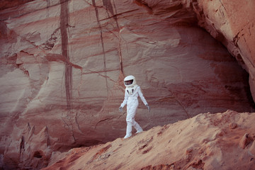 Naklejka premium futuristic astronaut on another planet, image with the effect of