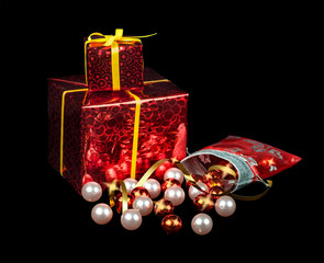 Christmas balls and gifts on a black background © Germanova Antonina