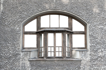 old window at the gray wall