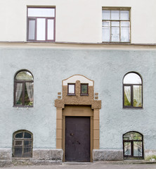 front door with Windows on the sides of a dwelling house