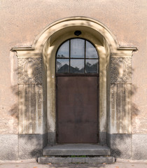 entrance door from the street with elements of architecture