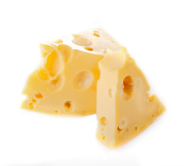 two slices of cheese with the big holes on white background