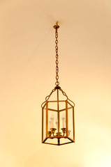 antique lamp hanging from the ceiling