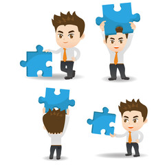 Business man hold puzzle