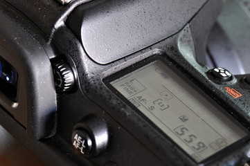 Closeup of professional digital camera. - obrazy, fototapety, plakaty