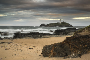 Beautiful sunrise landscape of Godrevy lighthouse on Cornwall co