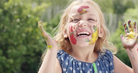 Happy family with little girl painting in the yard - Powered by Adobe