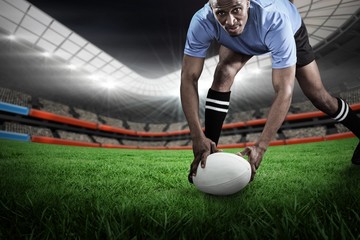 Naklejka premium Composite image of portrait of sportsman