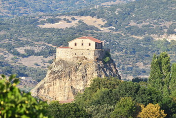Fototapeta na wymiar the church of Our Lady of the Sweet Kiss sits atop a rock outcrop above the town of Petra, Lesbos