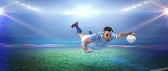 Composite image of rugby player scoring a try
