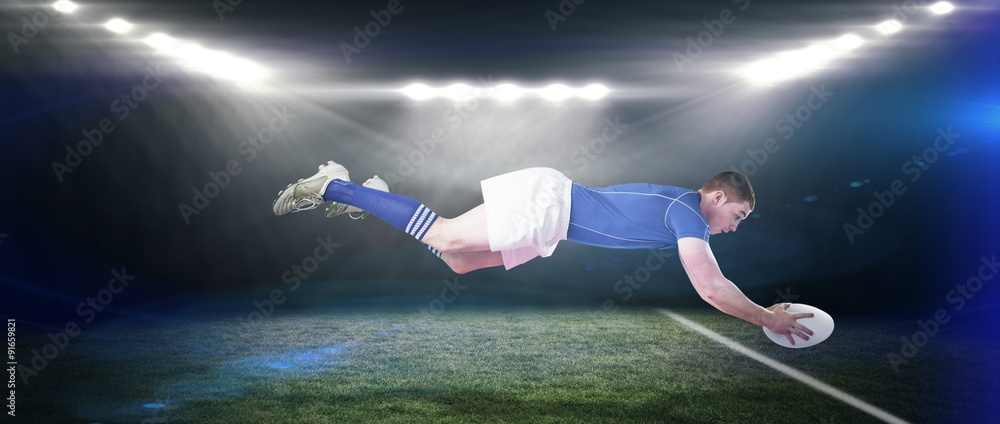 Poster composite image of a rugby player scoring a try