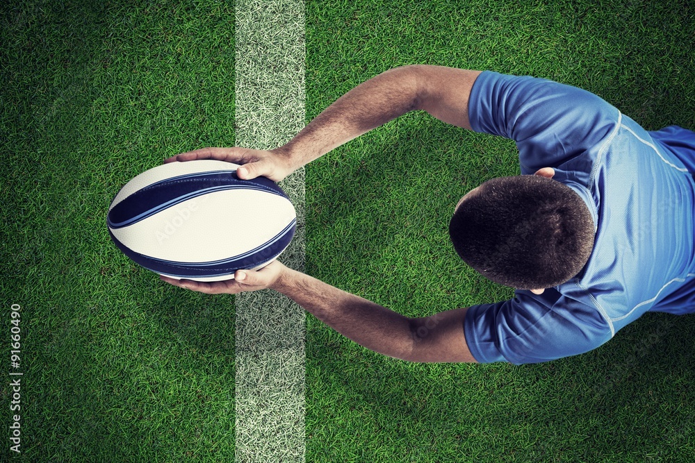 Poster composite image of rugby player lying in front with ball