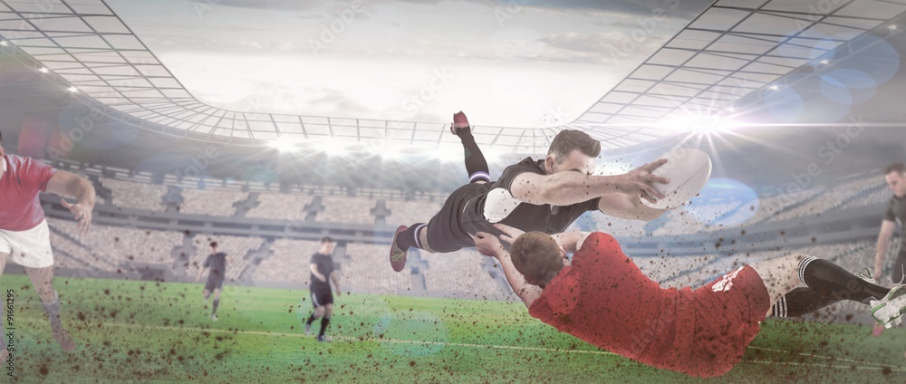 Poster composite image of a rugby player scoring a try