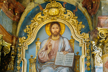 Fototapeta na wymiar Religious Orthodox Icon Of Sitting Lord Jesus Christ God With Op