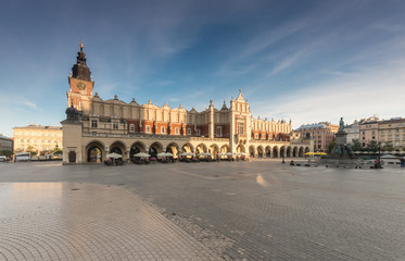 Naklejka na ściany i meble Cloth hall on the main market square in Krakow, Poland, during golden hour