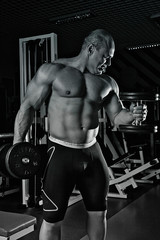 Fototapeta na wymiar athletic guy bodybuilder