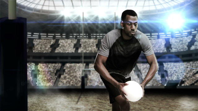 A rugby player scoring a try