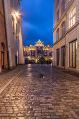 Fototapeta premium Old street paved with granite stones in Krakow old town