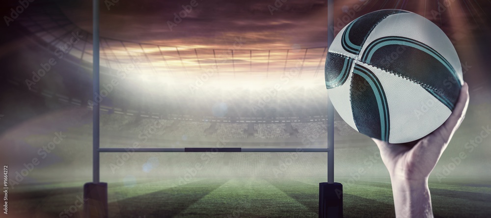 Poster composite image of close-up of of rugby player with arm raised