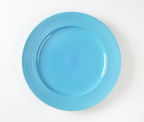 Turquoise dinner plate with wide rim