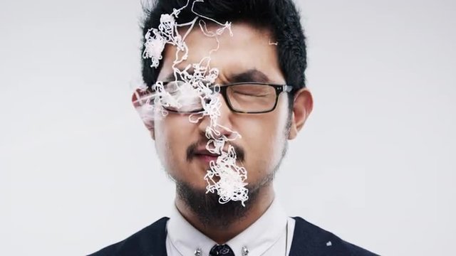 Funny Asian man silly string face slow motion wedding photo booth series