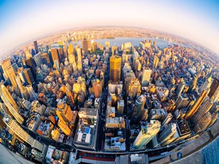 Abwaschbare Fototapete Aerial view of New York City at sunset © kmiragaya