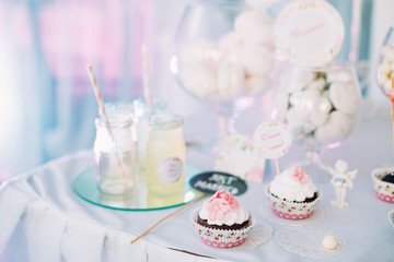 Dessert Sweet Cupcakes, Candy, confection On Table. Sweets. Cand