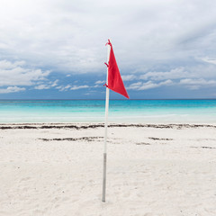 Lifeguard flag on caribbean beach