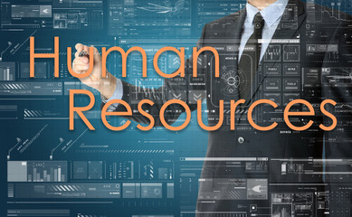 the businessman is writing Human Resources on the transparent bo
