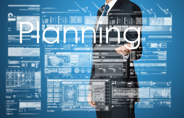 businessman presenting Planning text and graphs and diagrams