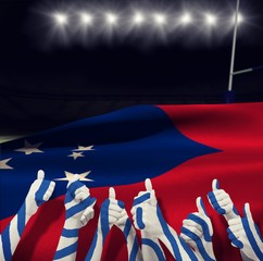 Composite image of group of hands giving thumbs up