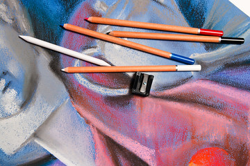 Pastel pencils and original pastel drawing of still life.