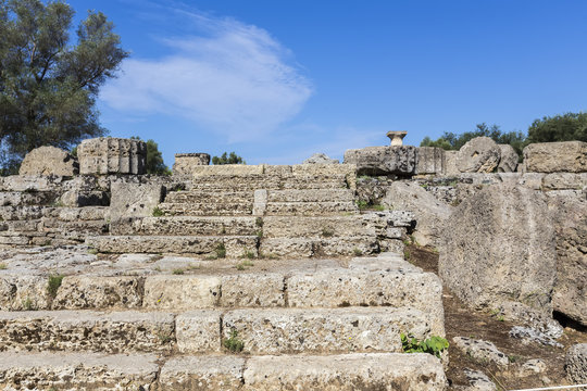 Ancient ruins of the temple Zeus, Olympia archeological site Pel
