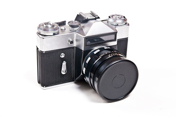 Old range finder vintage camera on white background.