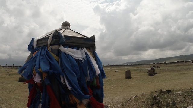 long prayer blue flags flutter in the wind at a Buddhist monastery in column
Erdene Zuu Buddhist monastery - one of the oldest monuments of Mongolia