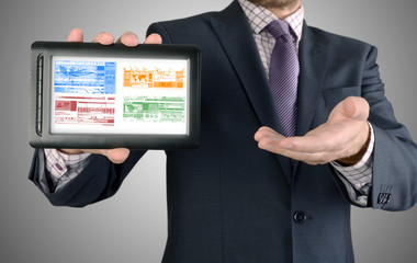 businessman working on financial graph on tablet