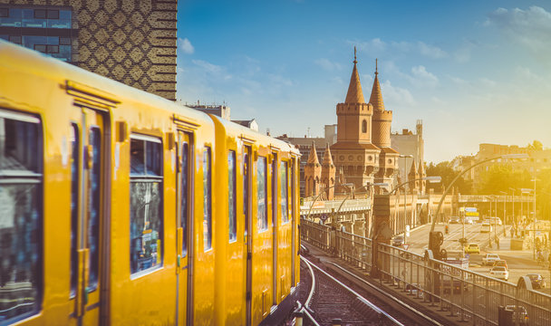 Berliner U-Bahn with Oberbaum Bridge at sunset, Berlin Friedrichshain-Kreuzberg, Germany