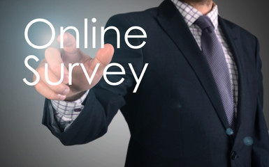 businessman pressing online survey