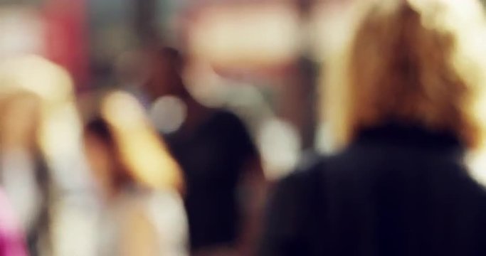 Anonymous crowd of business people walking in city streets london summer 2014