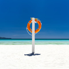 Lifebuoy ring on tropical beach