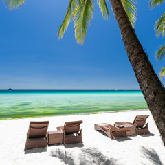 Beach chairs on a beautiful island,  Boracay